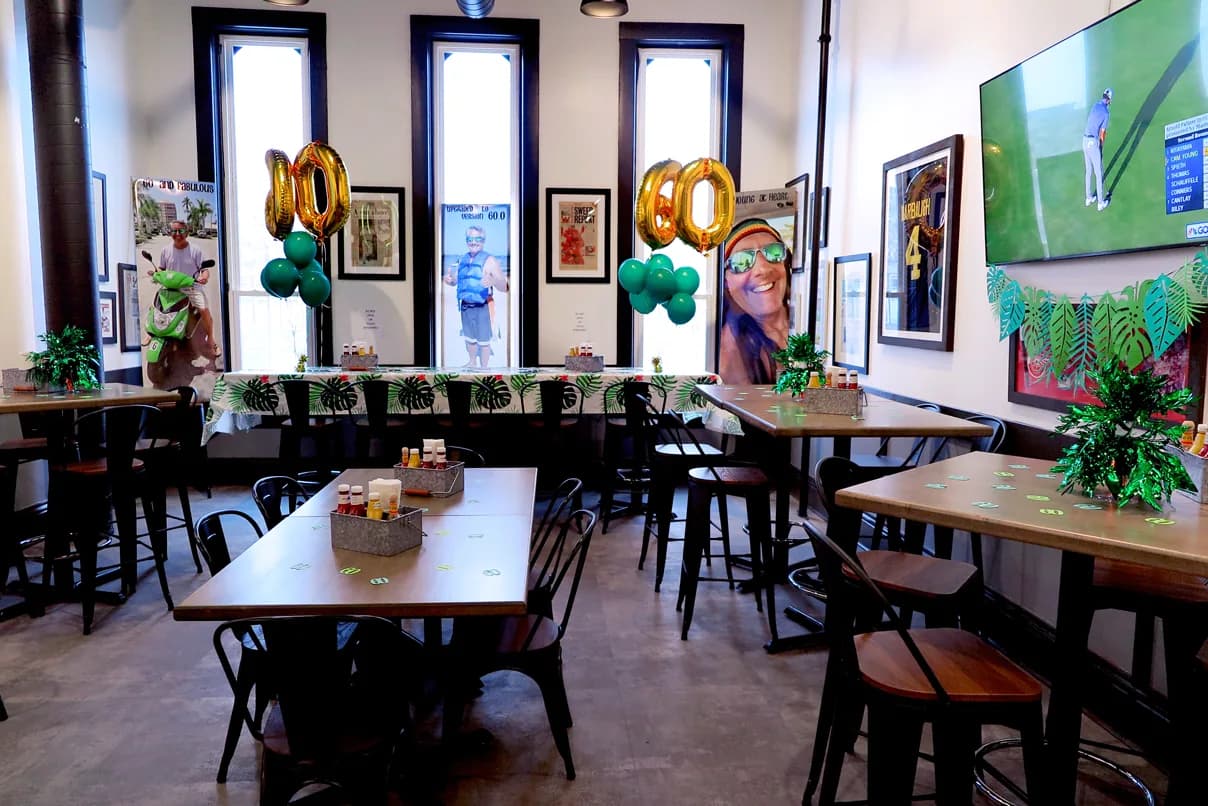 The Copper Reserve set up for a birthday party with balloons and centerpieces