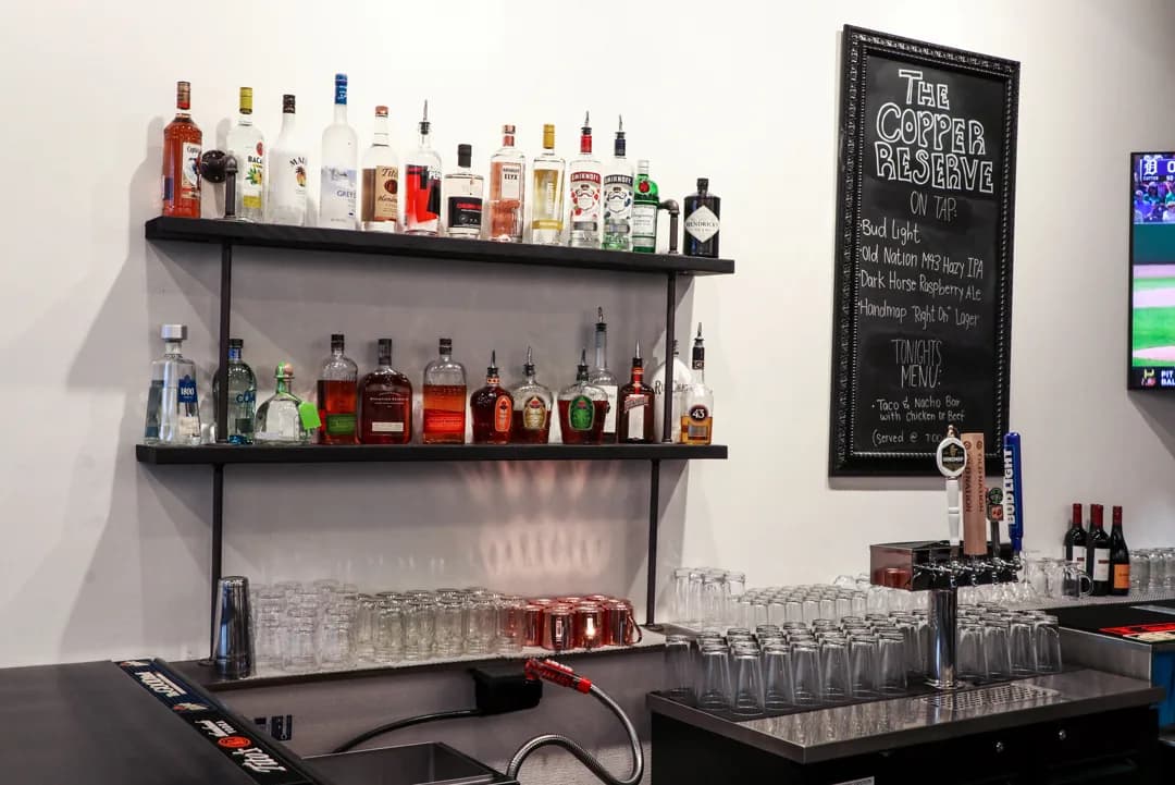 Liquor shelves behind the private bar in the Copper Reserve